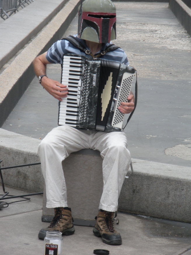 Little-known "Star Wars" trivia: Playing the accordion is actually Boba Fett's day job.